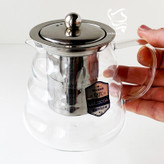 ست قوری و شات پیرکس برند دلی گلس، شامل یک قوری ۶۰۰ میلیلیتری و ۶ فنجان پیرکس مقاوم، با طراحی شیک و مناسب برای سرو چای و دمنوش.