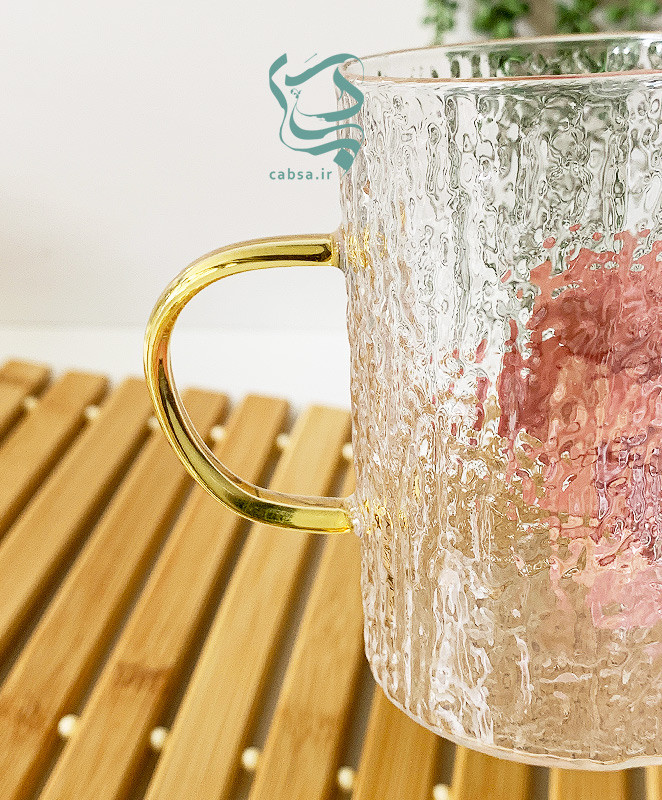 لیوان پیرکس طرح برفی دسته طلایی ماگ شفاف مناسب سرو نوشیدنیهای گرم و سرد