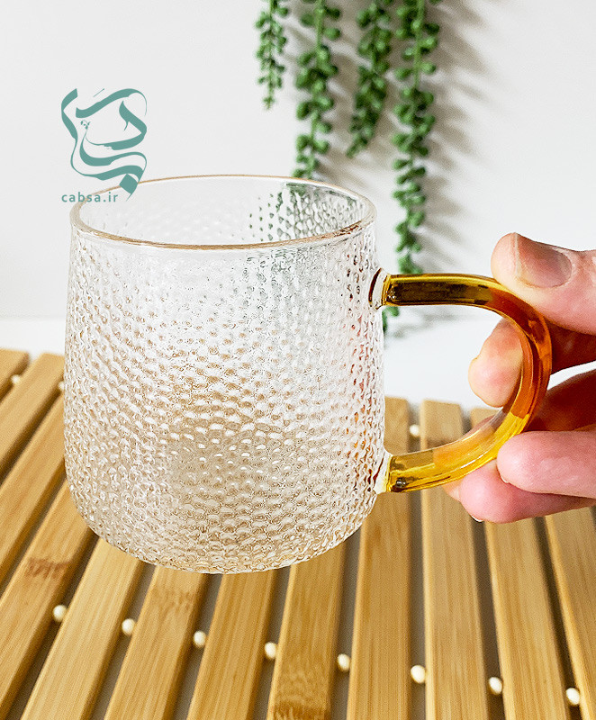 لیوان پیرکس طرح یخی دسته طلایی ماگ شفاف مناسب سرو نوشیدنیهای گرم و سرد