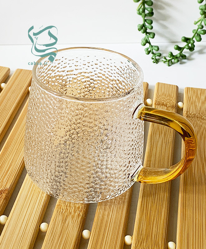 لیوان پیرکس طرح یخی دسته طلایی ماگ شفاف مناسب سرو نوشیدنیهای گرم و سرد