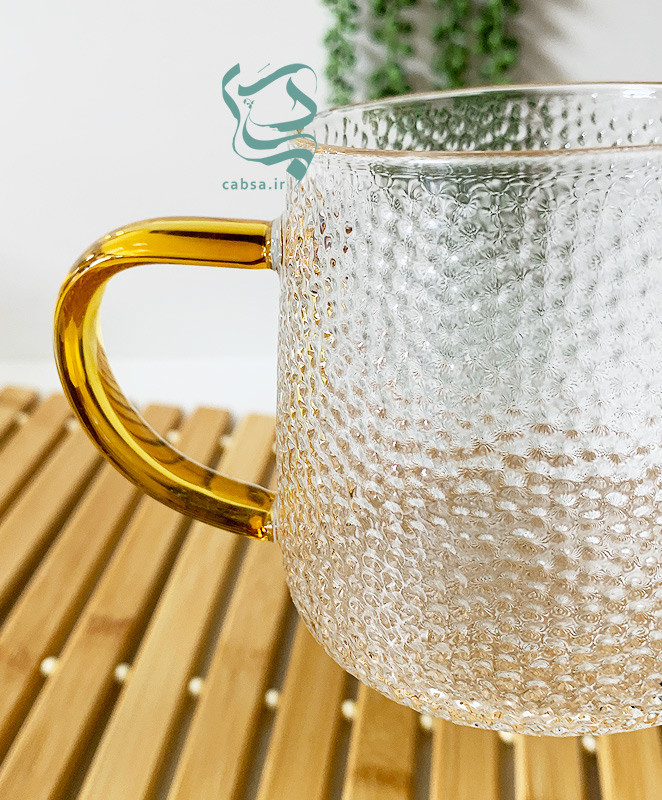 لیوان پیرکس طرح یخی دسته طلایی ماگ شفاف مناسب سرو نوشیدنیهای گرم و سرد