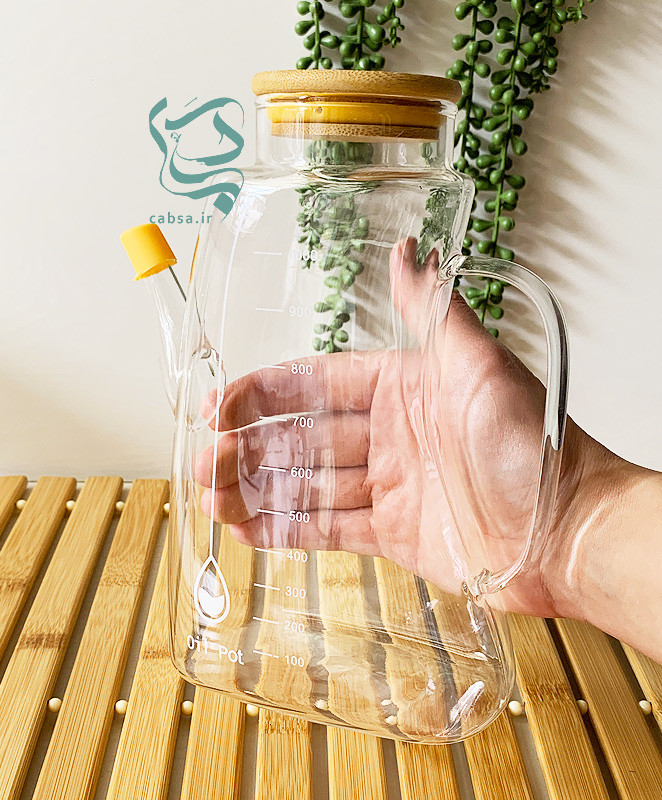 روغنریز پیرکس 1000 میل طرح کتابی با درب بامبو و واشر سیلیکونی – ظرف شفاف برای روغن، سرکه و آبلیمو