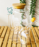 روغنریز پیرکس 1000 میل طرح کتابی با درب بامبو و واشر سیلیکونی – ظرف شفاف برای روغن، سرکه و آبلیمو