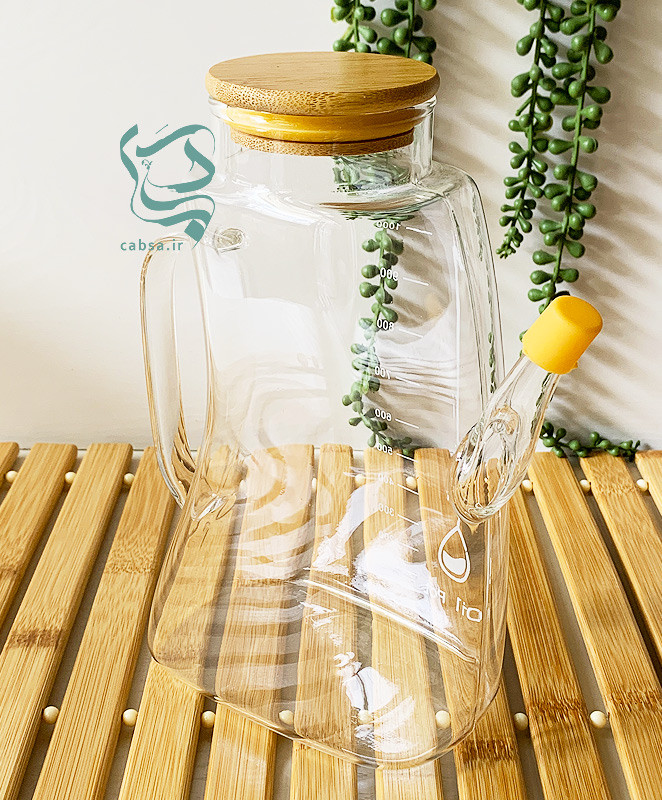 روغنریز پیرکس 1000 میل طرح کتابی با درب بامبو و واشر سیلیکونی – ظرف شفاف برای روغن، سرکه و آبلیمو